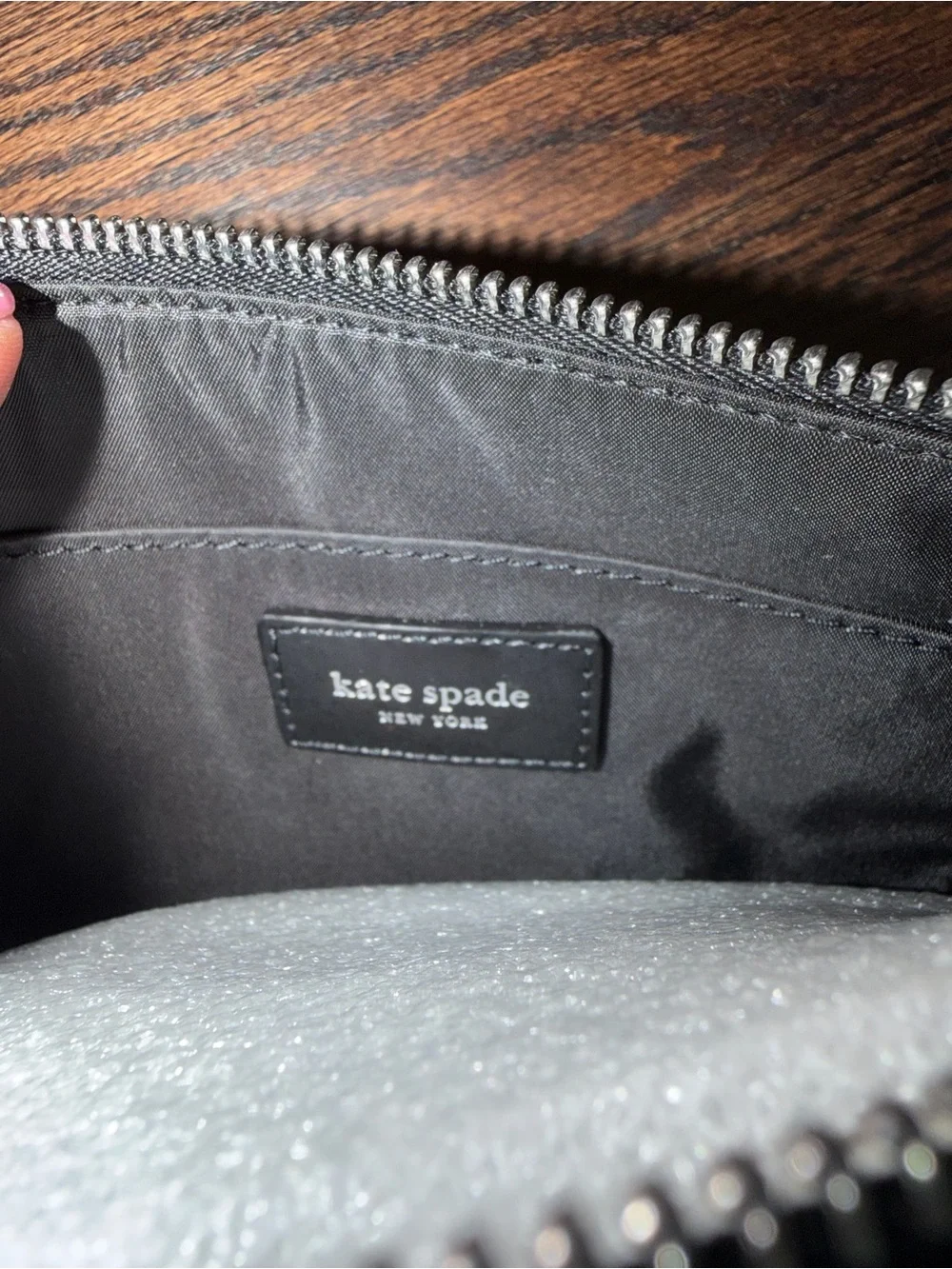 kate spade black toiletry pouch with zip-top